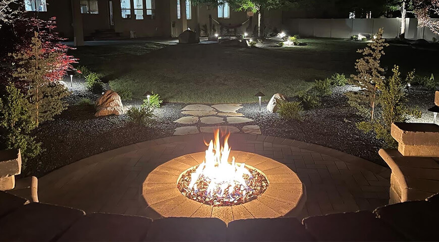 Outdoor living area with firepit and sitting area in Utah.